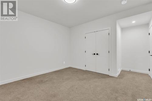 287 Flynn Bend, Saskatoon, SK - Indoor Photo Showing Other Room