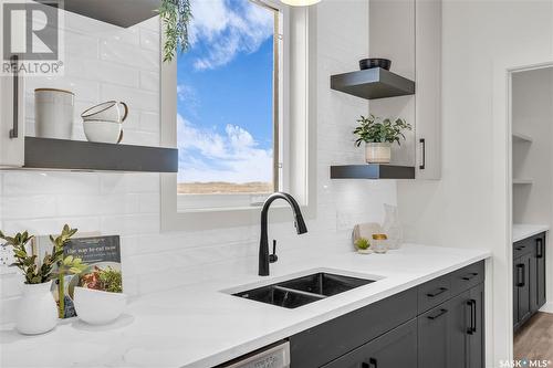 287 Flynn Bend, Saskatoon, SK - Indoor Photo Showing Kitchen With Double Sink With Upgraded Kitchen