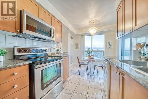 603 - 4889 Kimbermount Avenue, Mississauga, ON - Indoor Photo Showing Kitchen With Upgraded Kitchen