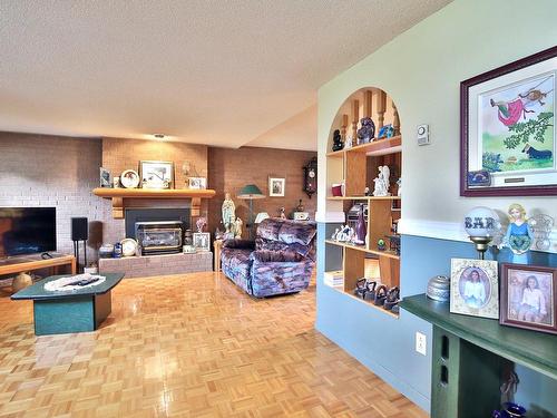 Family room - 5095 Rue Jolliet, Saint-Hyacinthe, QC - Indoor Photo Showing Living Room With Fireplace