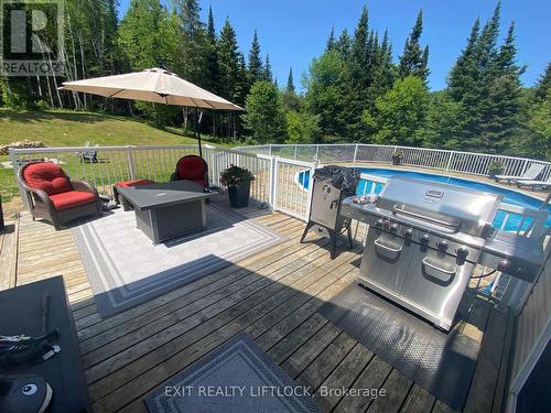 31474 Highway 28, Bancroft, ON - Outdoor With Above Ground Pool With Deck Patio Veranda