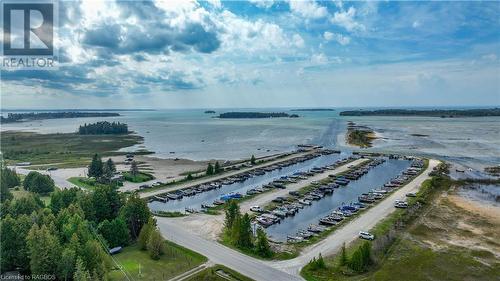 Oliphant Beach and Marina - 77 Shoreline Avenue, South Bruce Peninsula, ON - Outdoor With Body Of Water With View