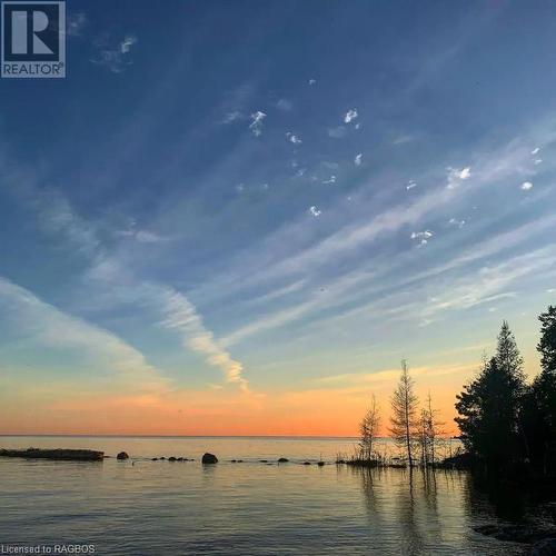 View of Lake Huron across road - 93 Shoreline Avenue, South Bruce Peninsula, ON - Outdoor With Body Of Water With View