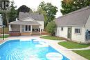 Backyard with pool and hot tub, shop with loft. - 294 Broadway Street, Tillsonburg, ON  - Outdoor 