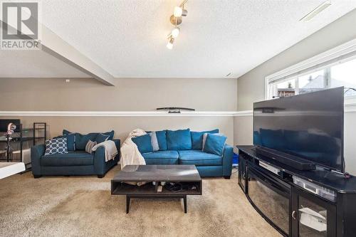 Exspansive Living Room with very large window to the back yard - 111 Erin Meadow Green Se, Calgary, AB 