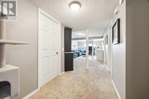 View from bedroom.  Furnace room on the left with storage, laundry room on the right with storage - 111 Erin Meadow Green Se, Calgary, AB 