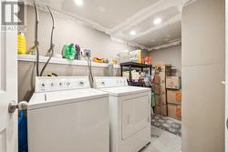 Private laundry for legal lower suite with extra storage - 