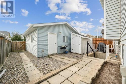 Double detached garage, shed and low maintenance landscape - 111 Erin Meadow Green Se, Calgary, AB 