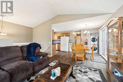 View to kitchen and stairs down to front door - 111 Erin Meadow Green Se, Calgary, AB 