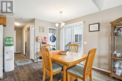 Large Dining Area and patio doors to a BBQ deck - 111 Erin Meadow Green Se, Calgary, AB 