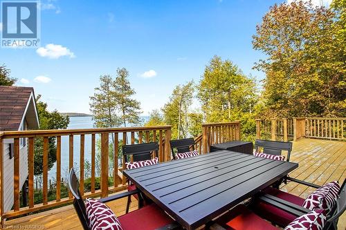 Walk-out from the main area Great Room to 360 feet of elevated decking. - 139 Ivy Drive, Georgian Bluffs, ON - Outdoor With Deck Patio Veranda With Exterior