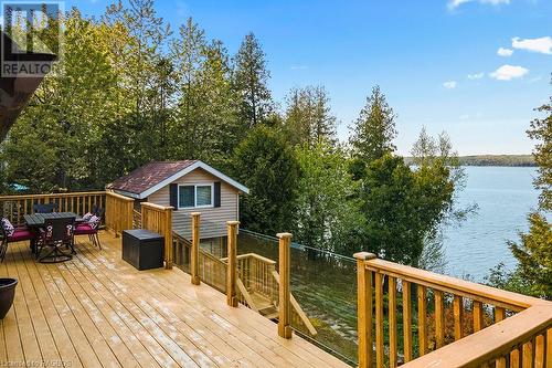 On the shores of incredible Georgian Bay. - 139 Ivy Drive, Georgian Bluffs, ON - Outdoor With Body Of Water With Deck Patio Veranda