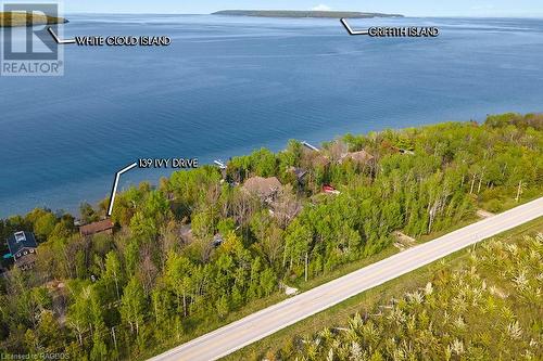 Blue, blue clear Georgian Bay waters. - 139 Ivy Drive, Georgian Bluffs, ON - Outdoor With Body Of Water With View