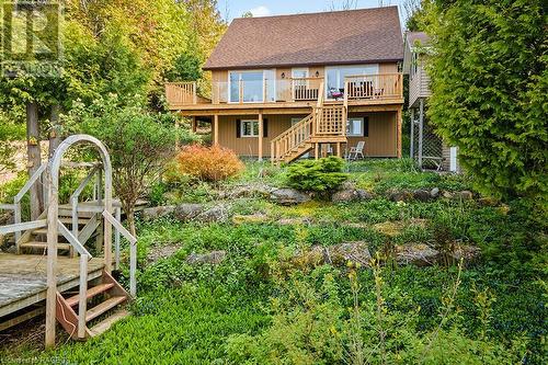 Multi-tiered natural rock landscaping. - 139 Ivy Drive, Georgian Bluffs, ON - Outdoor With Deck Patio Veranda