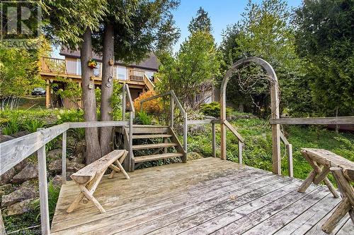 Built into the natural rock landscape. - 139 Ivy Drive, Georgian Bluffs, ON - Outdoor With Deck Patio Veranda