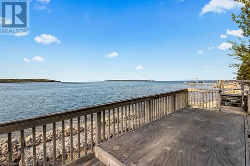 Amazing crystal clear Georgian Bay waterfront. - 139 Ivy Drive, Georgian Bluffs, ON - Outdoor With Body Of Water With Deck Patio Veranda With View