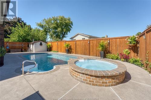 1863 Heatherstone Way, Lasalle, ON - Outdoor With In Ground Pool With Backyard