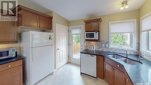 2742 Windsor Park Road, Regina, SK - Indoor Photo Showing Kitchen With Double Sink