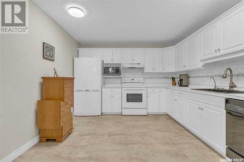 109 2244 Smith Street, Regina, SK - Indoor Photo Showing Kitchen With Double Sink