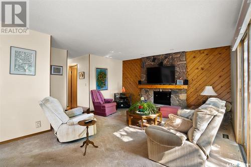 327 Williston Drive, Regina, SK - Indoor Photo Showing Living Room With Fireplace