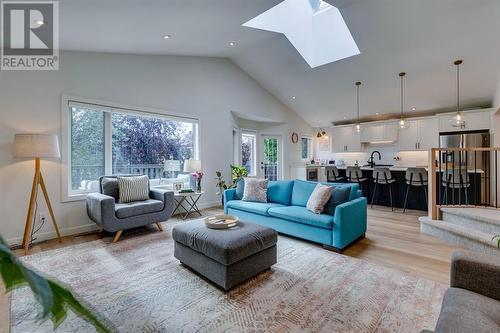 354 Mountain Park Drive Se, Calgary, AB - Indoor Photo Showing Living Room