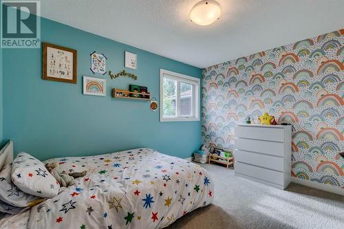 354 Mountain Park Drive Se, Calgary, AB - Indoor Photo Showing Bedroom