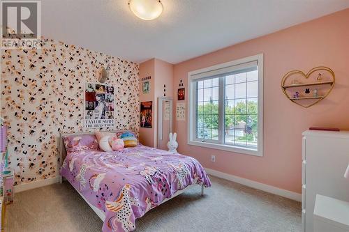 354 Mountain Park Drive Se, Calgary, AB - Indoor Photo Showing Bedroom