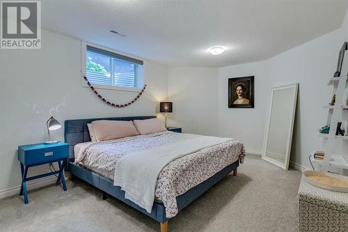 354 Mountain Park Drive Se, Calgary, AB - Indoor Photo Showing Bedroom