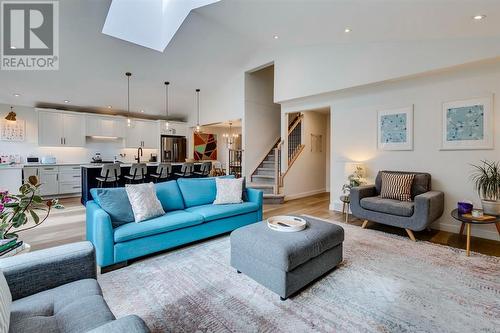 354 Mountain Park Drive Se, Calgary, AB - Indoor Photo Showing Living Room