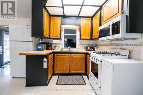 D-24 - 153 County Road 27, Prince Edward County (Ameliasburgh), ON - Indoor Photo Showing Kitchen With Double Sink