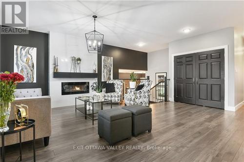 35 Vera Crescent, Whitewater Region, ON - Indoor Photo Showing Living Room With Fireplace