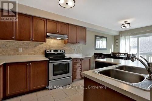 3376 Mikalda Road, Burlington, ON - Indoor Photo Showing Kitchen With Double Sink