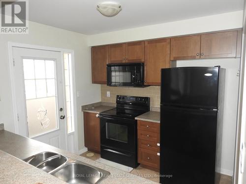 56 Finney Terrace, Milton, ON - Indoor Photo Showing Kitchen With Double Sink