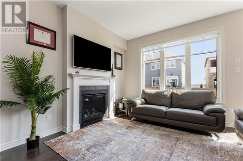 318 Cosanti Drive, Stittsville, ON - Indoor Photo Showing Living Room With Fireplace