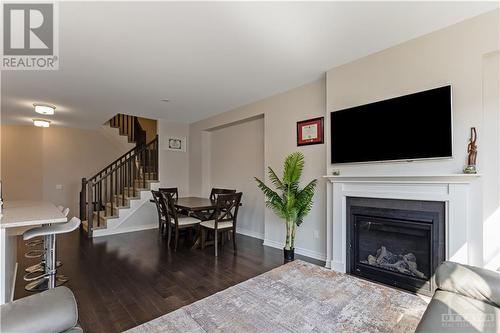 318 Cosanti Drive, Stittsville, ON - Indoor Photo Showing Living Room With Fireplace