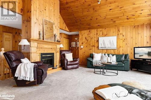 200 Edgemere Road E, Port Sydney, ON - Indoor Photo Showing Living Room With Fireplace