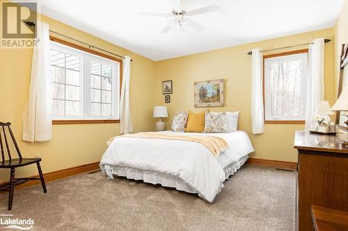 Main Floor Guest Bedroom - 200 Edgemere Road E, Port Sydney, ON - Indoor Photo Showing Bedroom