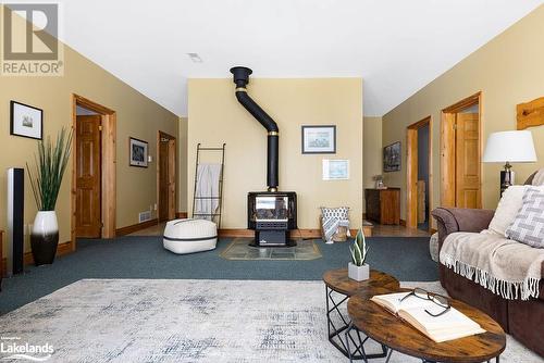 200 Edgemere Road E, Port Sydney, ON - Indoor Photo Showing Living Room With Fireplace