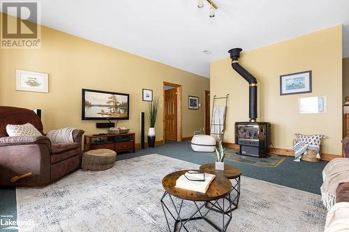 200 Edgemere Road E, Port Sydney, ON - Indoor Photo Showing Living Room With Fireplace