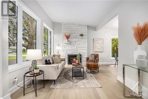 15 Cedarbank Avenue, Ottawa, ON - Indoor Photo Showing Living Room With Fireplace