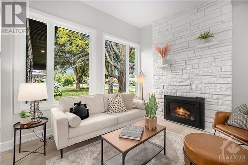 15 Cedarbank Avenue, Ottawa, ON - Indoor Photo Showing Living Room With Fireplace