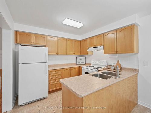 12 Butterchurn Rd, Brampton, ON - Indoor Photo Showing Kitchen With Double Sink