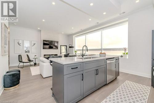 1880 Gordon Street Unit# 204, Guelph, ON - Indoor Photo Showing Kitchen With Double Sink With Upgraded Kitchen