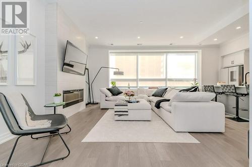 1880 Gordon Street Unit# 204, Guelph, ON - Indoor Photo Showing Living Room With Fireplace