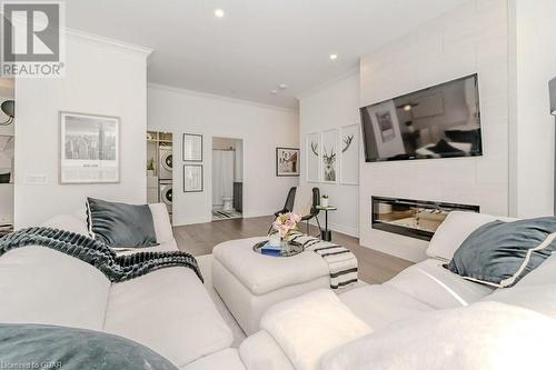 1880 Gordon Street Unit# 204, Guelph, ON - Indoor Photo Showing Living Room With Fireplace