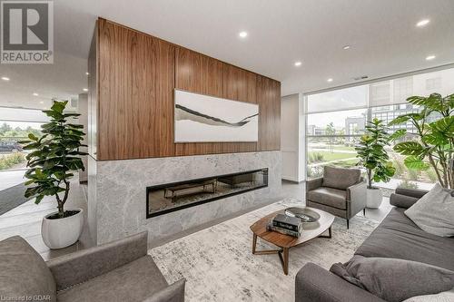 1880 Gordon Street Unit# 204, Guelph, ON - Indoor Photo Showing Living Room With Fireplace