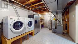 Laundry/Utility room in basement - 