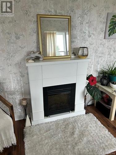 8 Park Avenue, St. Martins, NB - Indoor Photo Showing Living Room With Fireplace