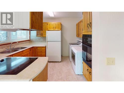 1291 9Th  Avenue, Fernie, BC - Indoor Photo Showing Kitchen With Double Sink