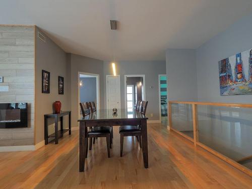 Dining room - 25 Rue Des Golfeurs, Trois-Rivières, QC - Indoor Photo Showing Dining Room With Fireplace